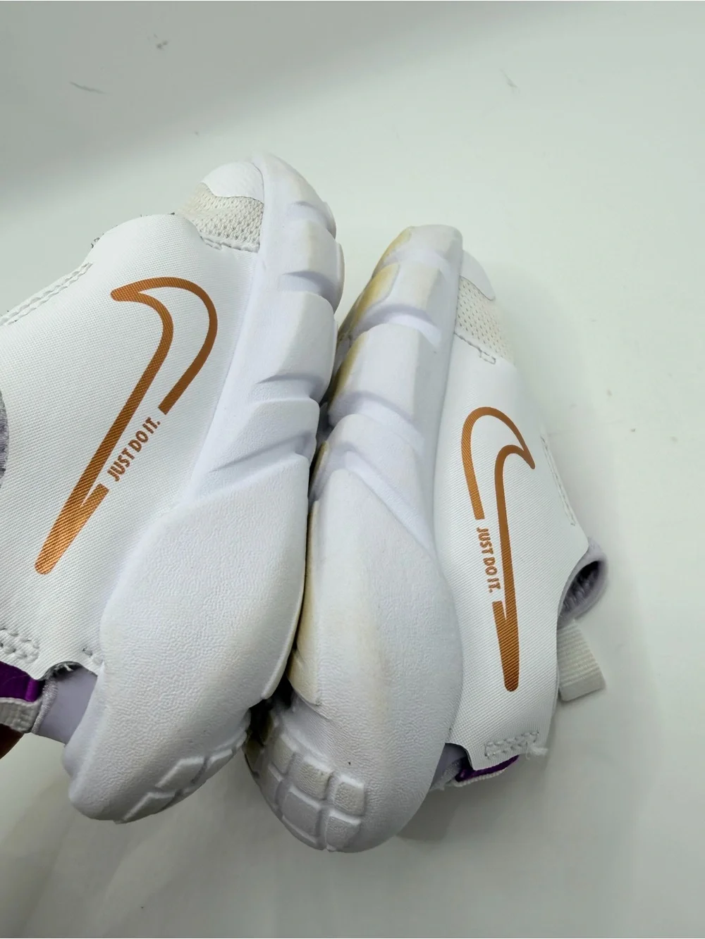 Nike Kids White Sneakers with Purple Strap and Gold Swoosh